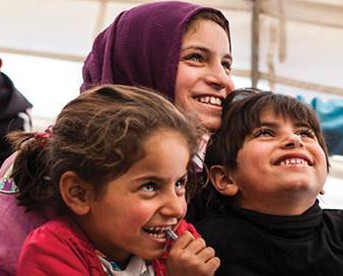 El refugiats són benvinguts, imatge de nens somrient